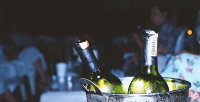 two liquor bottles in bucket